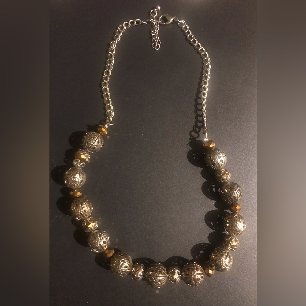 necklace with metal and gold color beads
